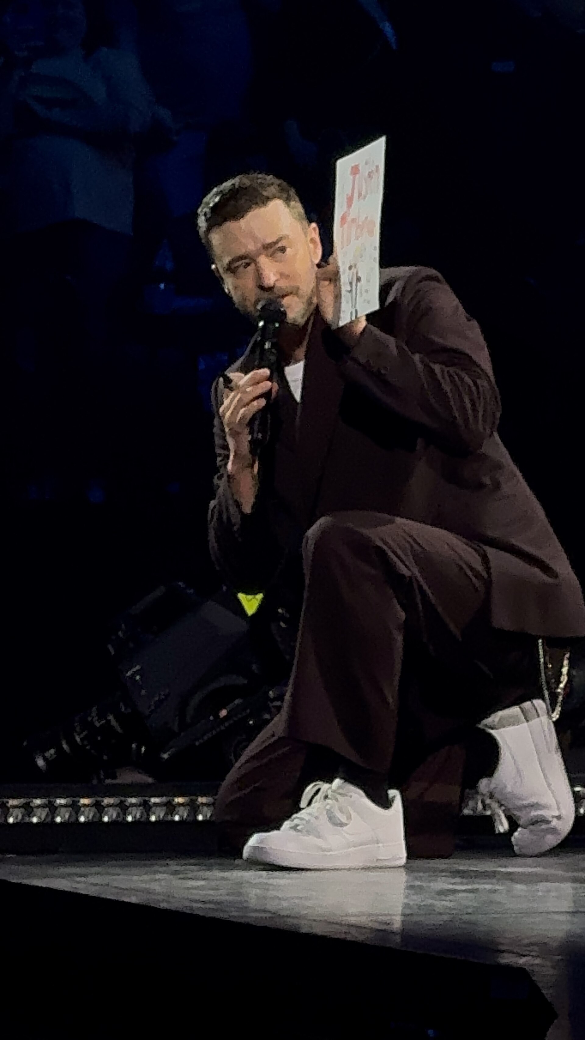 Justin Timberlake performing onstage in 2025