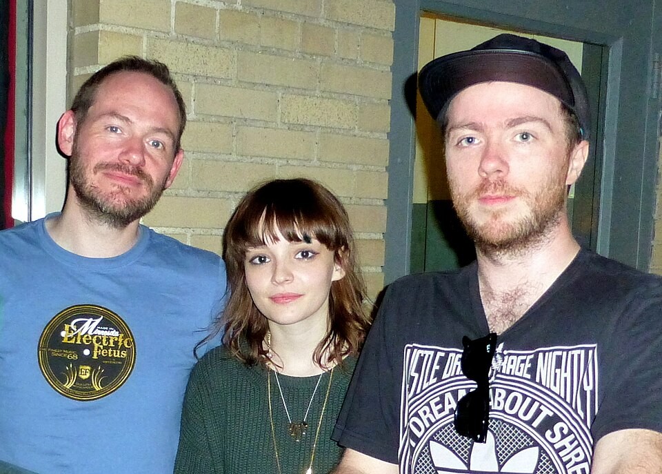Iain Cook, Lauren Mayberry and Martin Doherty of CHVRCHES together in a 2014 photograph