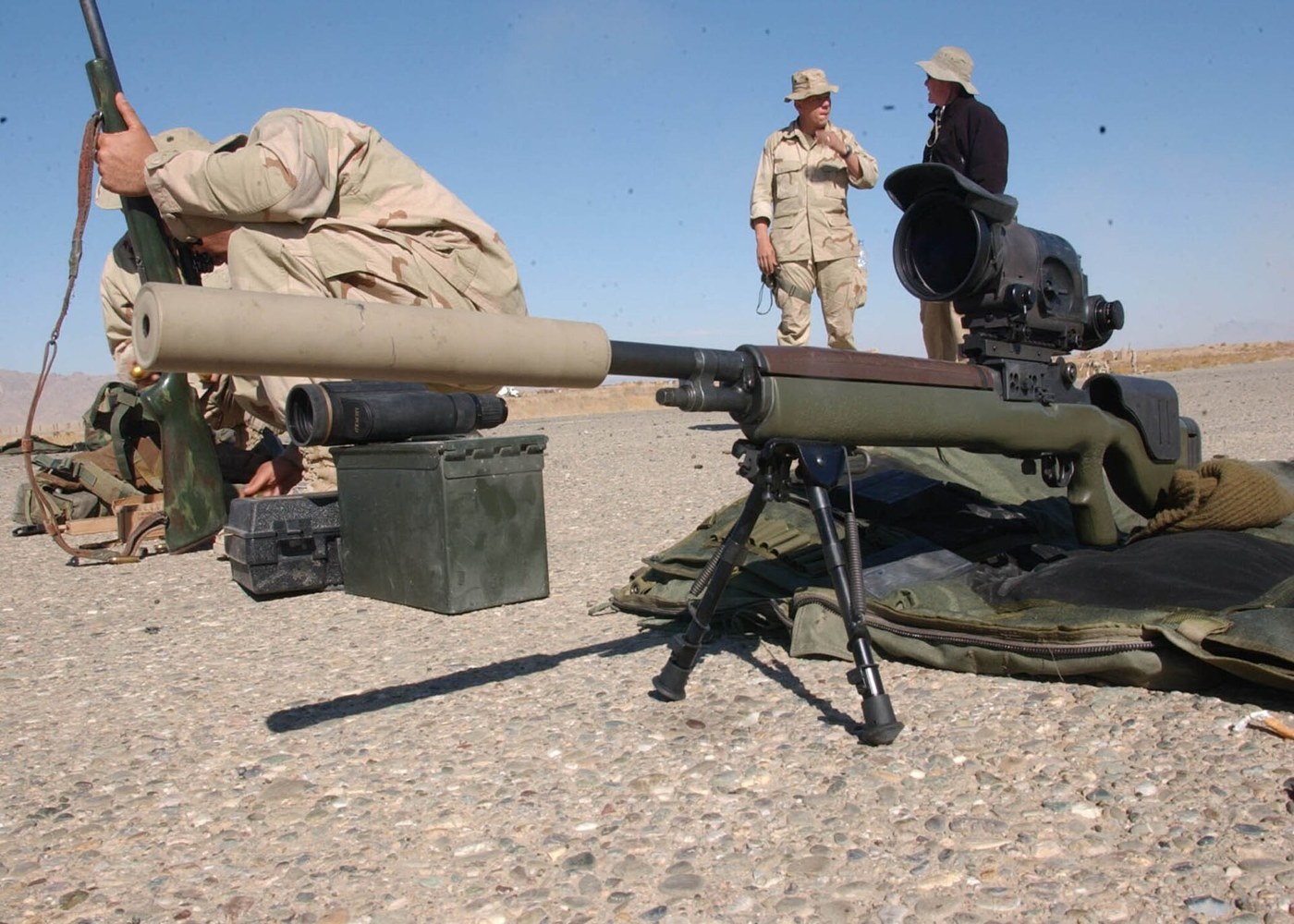 A firearm suppressor displayed separately from a gun