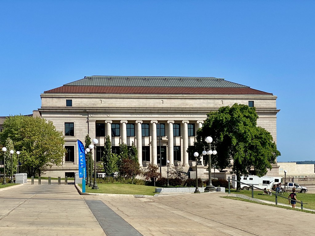 File photograph of the Minnesota Judicial Center in Saint Paul, with columns, trees and a plaza in 2021.