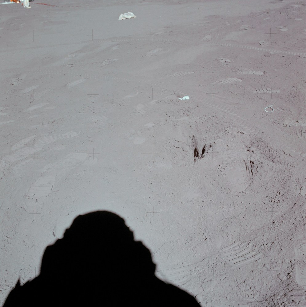 A scientist examining lunar material in a laboratory