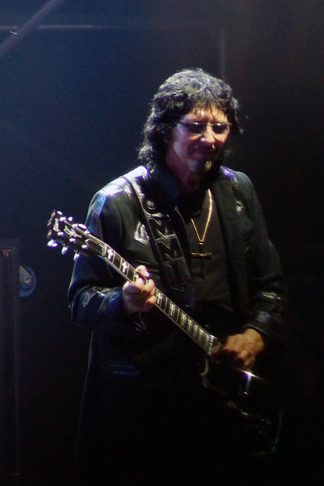 Tony Iommi playing guitar with Black Sabbath at Lollapalooza on August 3, 2012
