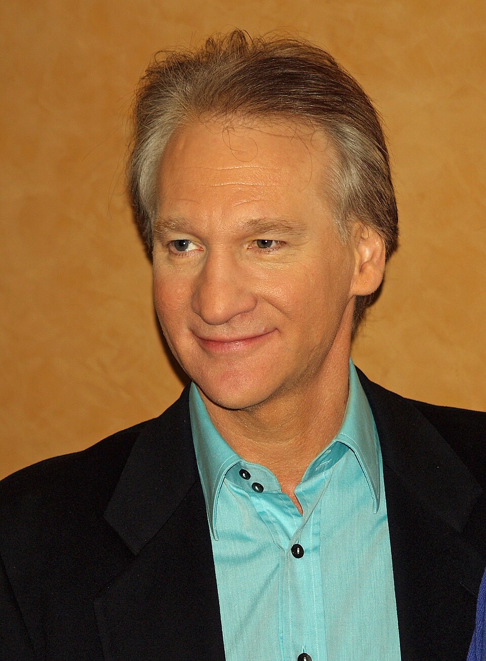 Bill Maher wearing a dark jacket and turquoise shirt at a screening in November 2007.