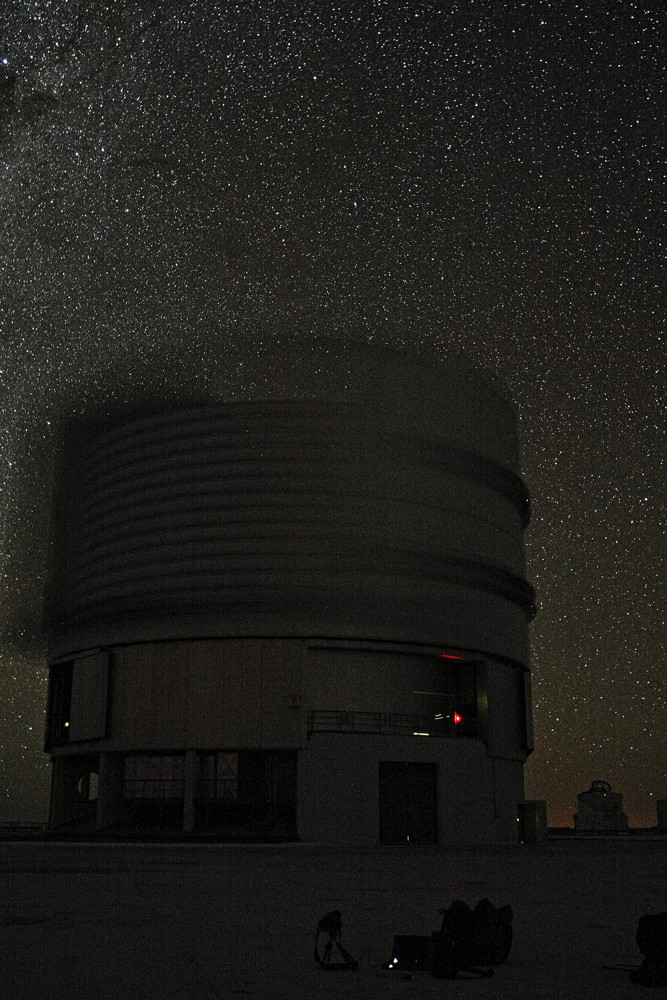 ESO telescope enclosures at night beneath the sky