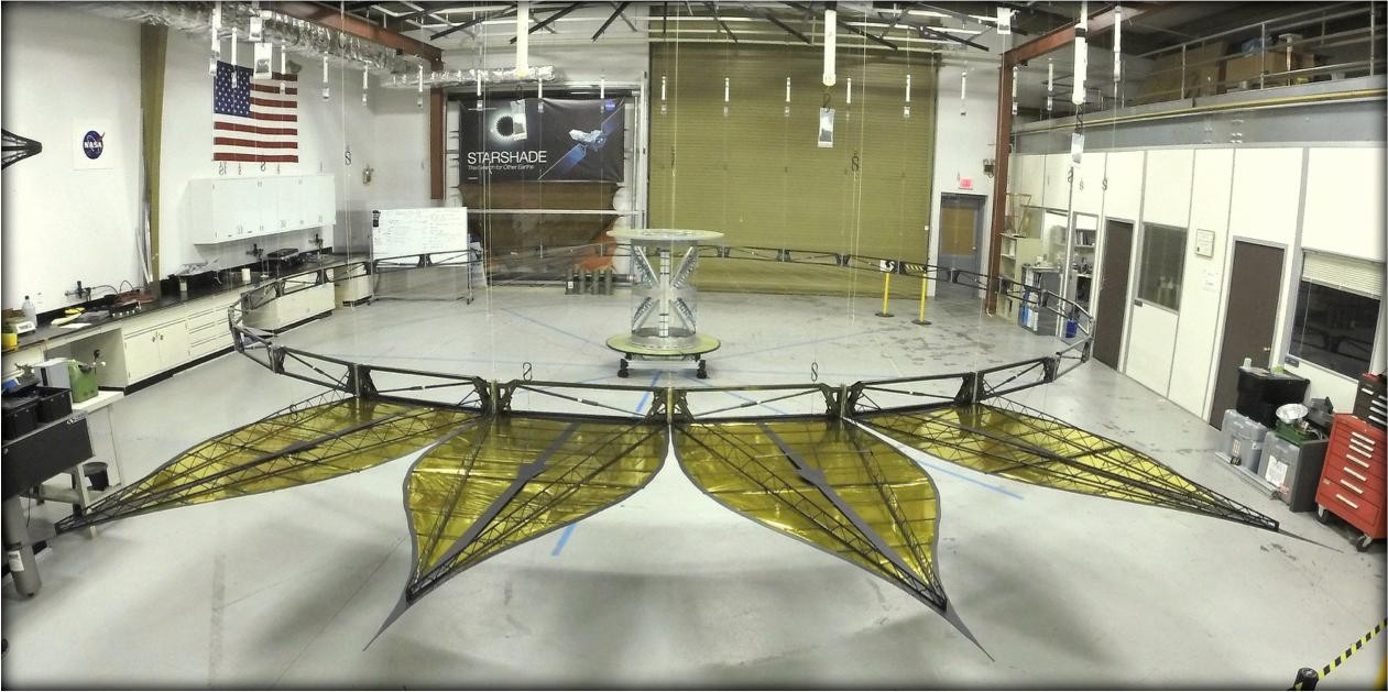 A real half-scale four-petal starshade deployed at NASA JPL in 2014