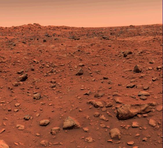Historic Viking 1 color photograph of the rocky orange-red Martian surface and sky, taken July 21, 1976.
