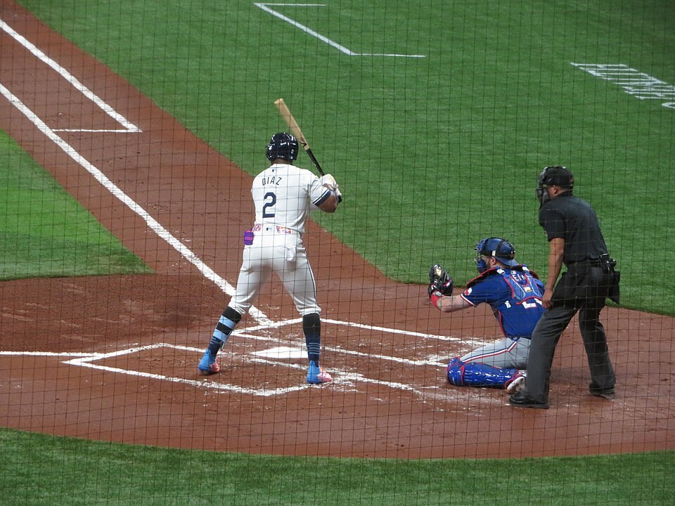 Yandy Díaz wearing Tampa Bay’s number 2 and holding a bat at Tropicana Field in April 2024